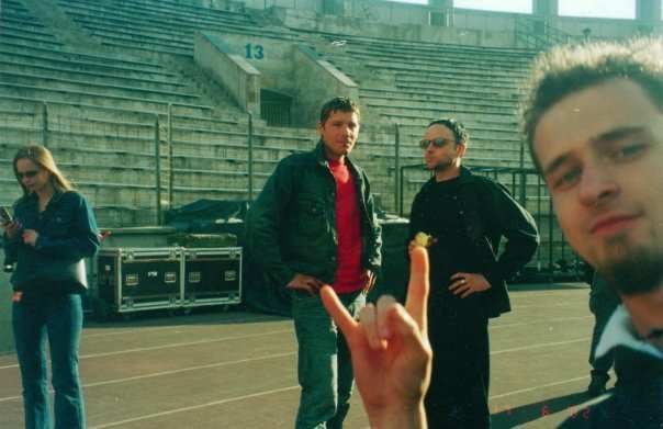 Paul Landers and Christoph Schneider standing inside a concert venue in 2002 Russia